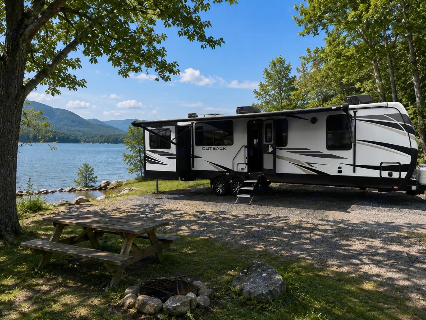 Exterior of a Keystone Outback travel trailer with the awning extended